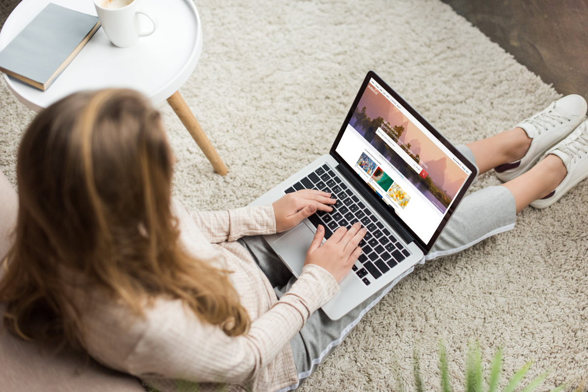 A woman viewing a website's homepage