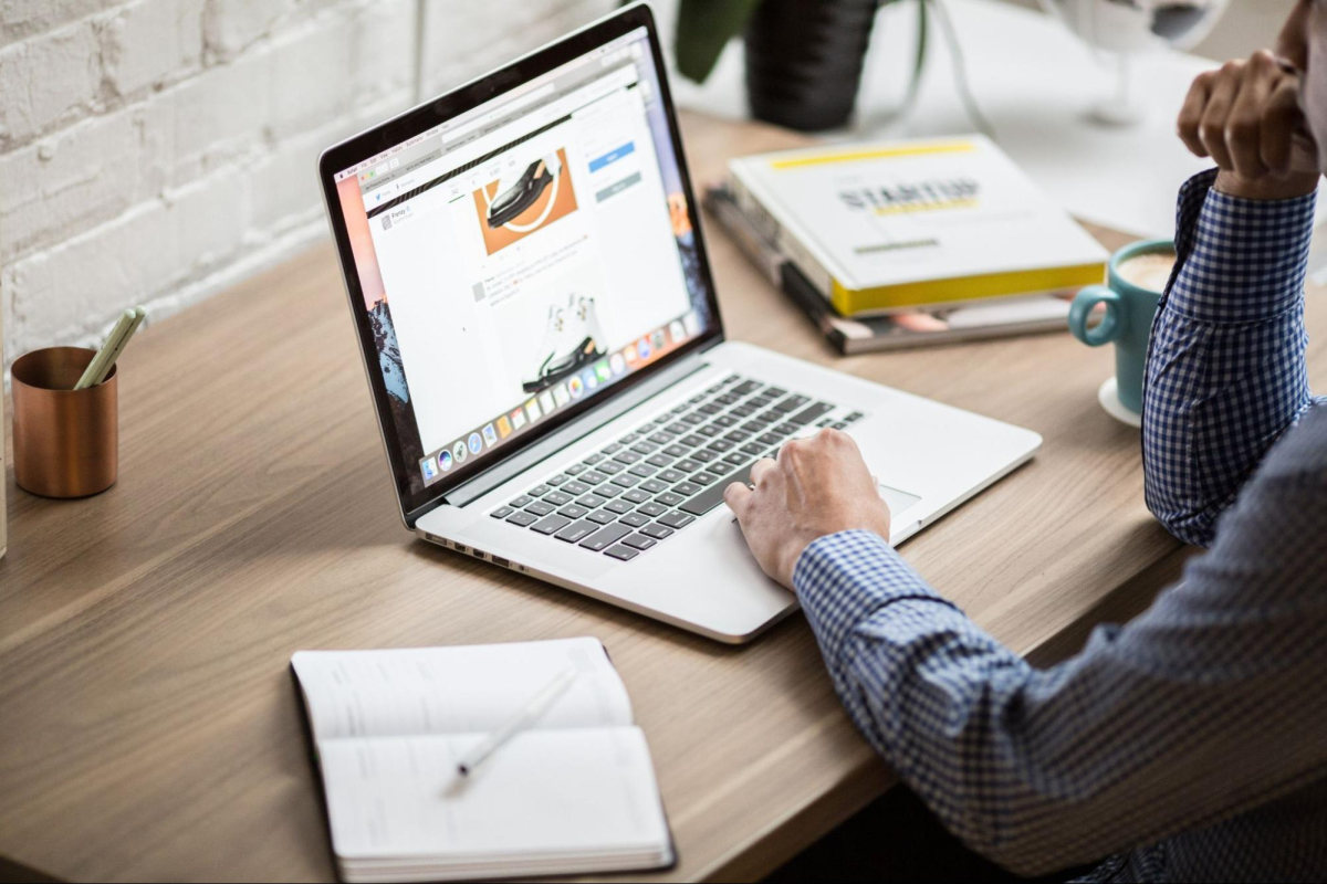 A person looking at user experience on a computer